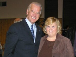 Connie Wilson standing with Joe Biden.