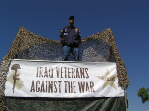 Pinky Ornstein in Denver with banner saying "Iraq Veterans Against The War"